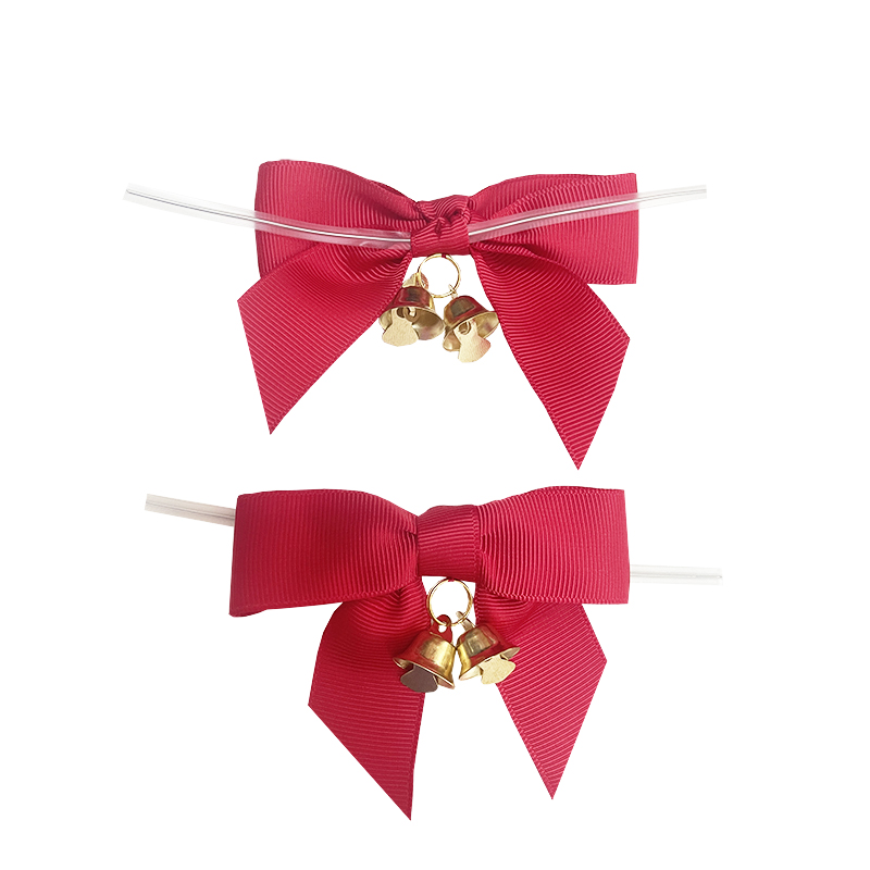 Manufacture shoelace bows with gold bells for X-mas holiday decoration